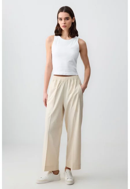 Широк панталон с еластична талия - Светло бежово
