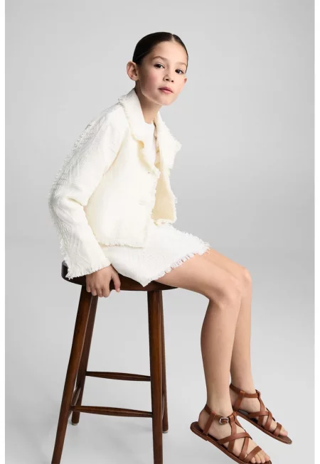 Късо яке с раздвоен ревер и ресни