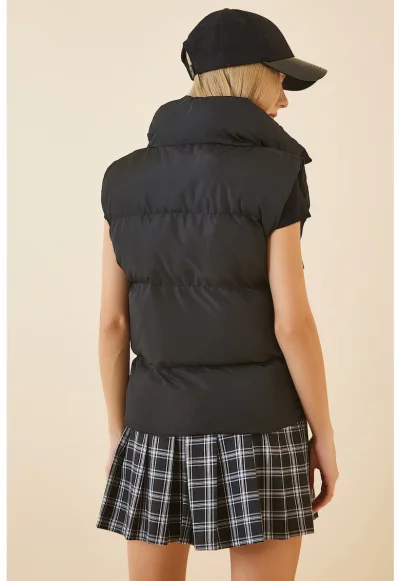 Капитониран елек с джобове с цип