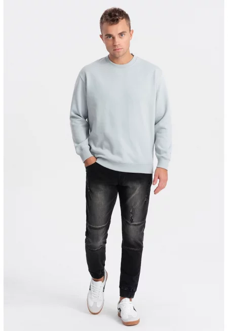 Скосени дънки с връзки и захабен ефект