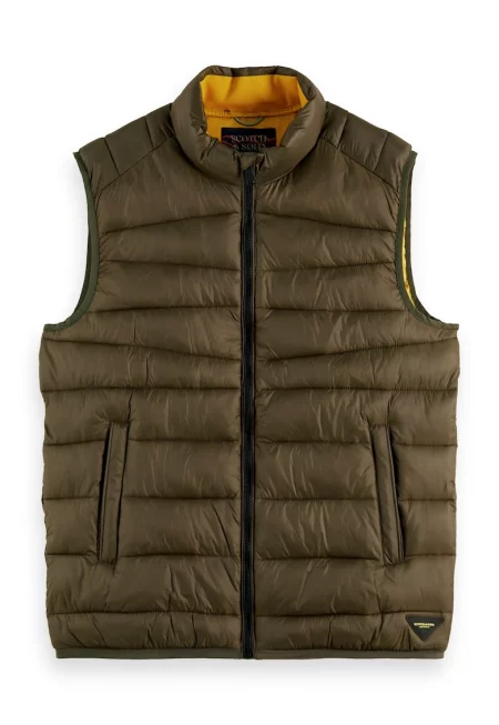 Капитониран елек с джобове встрани