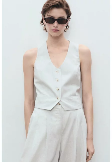 Къс елек с лен и обшити джобове