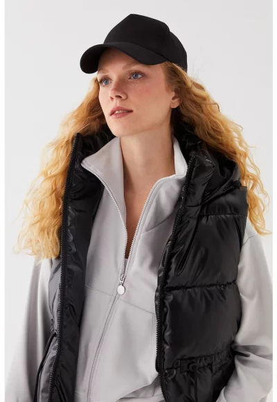 Капитониран елек