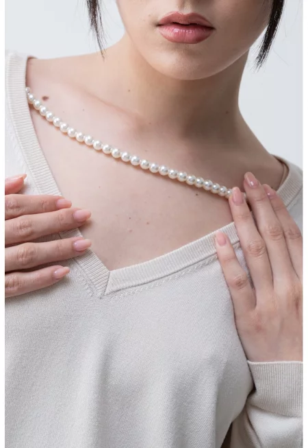 Свободен пуловер с шпиц - Светло бежово