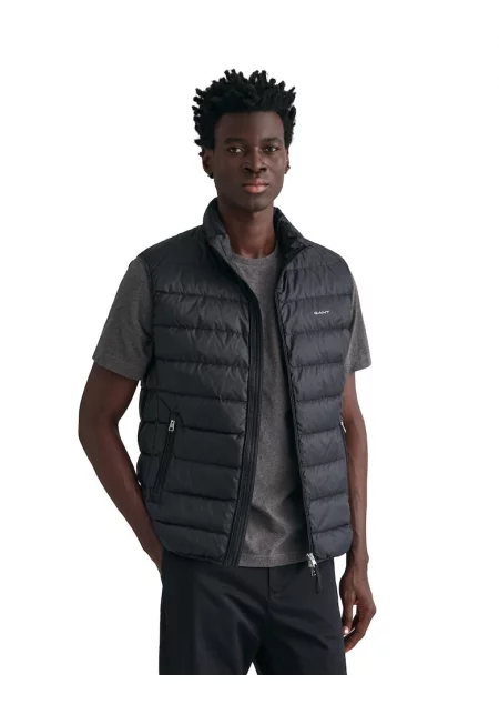 Едноцветен капитониран елек