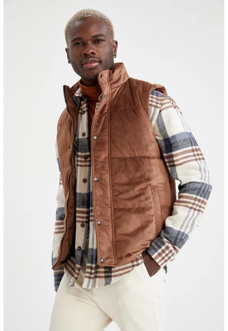 Ватиран джинсов елек