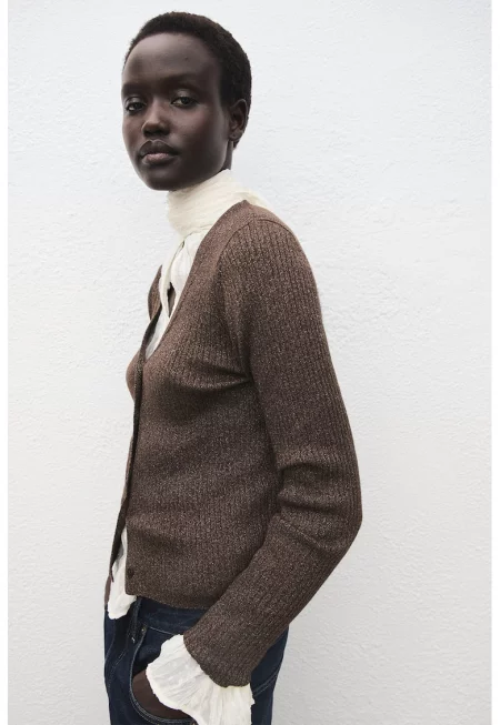 Плетена шпиц жилетка