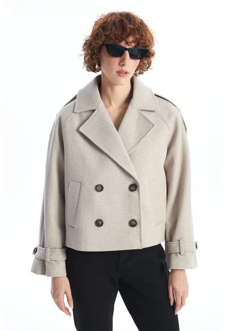 Късо палто с ръкави реглан