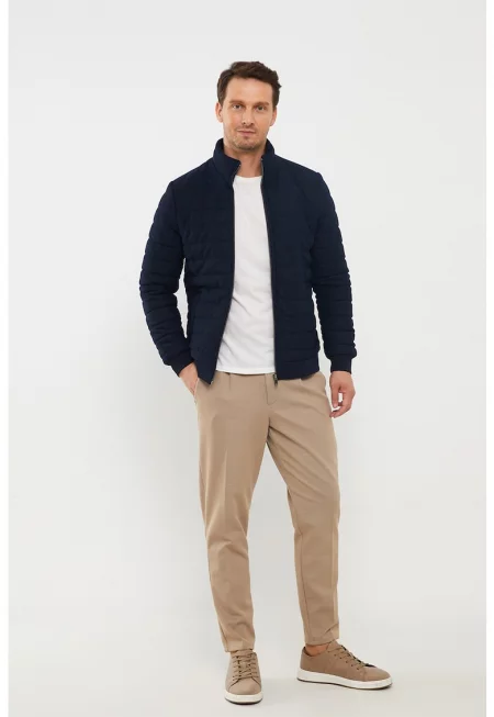 Капитонирано яке със скосени джобове