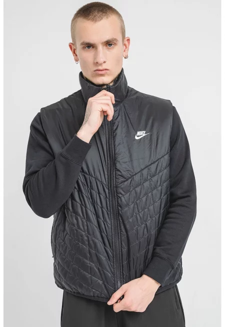 Капитониран елек с джобове встрани