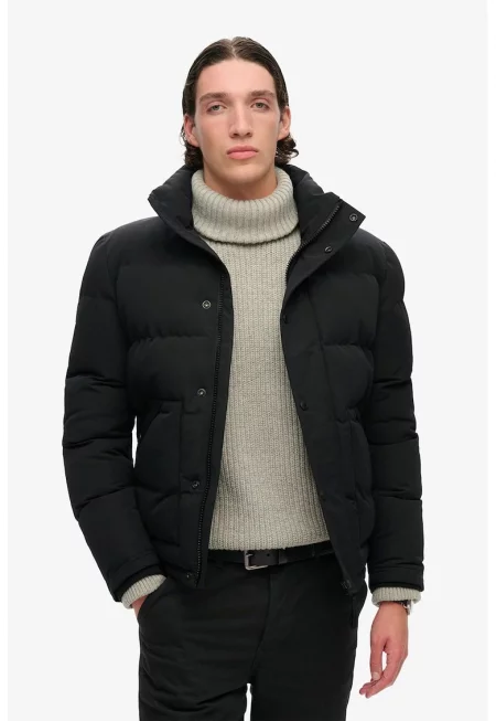 Капитонирано зимно яке със скосени джобове