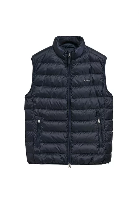 Едноцветен капитониран елек - Син