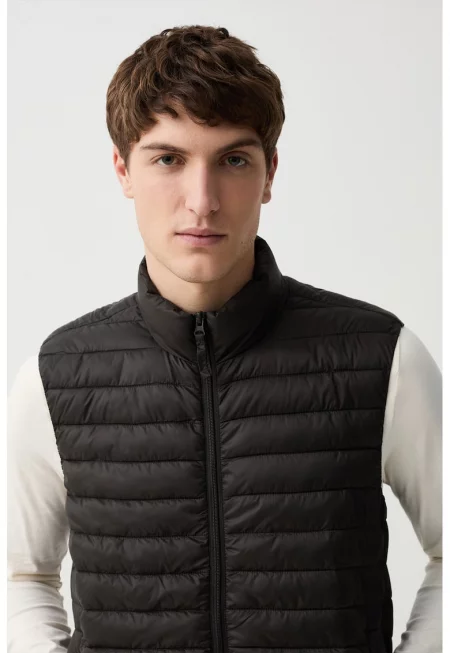 Капитониран елек с цип