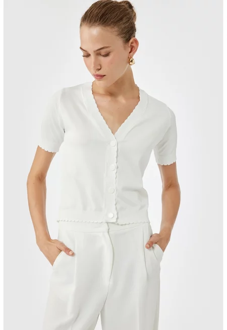 Къса жилетка с къдрави краища