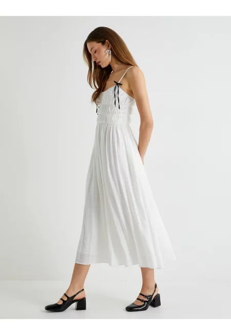 Разкроена миди рокля с джобове встрани - Мръснобял