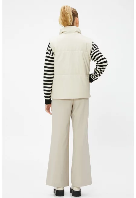 Капитониран елек с джобове